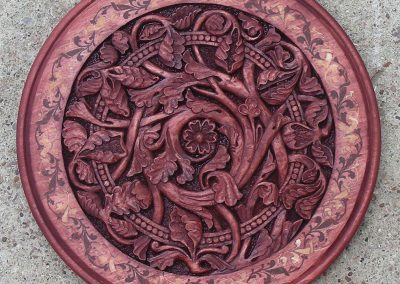 Another wooden plate carved by Roger.