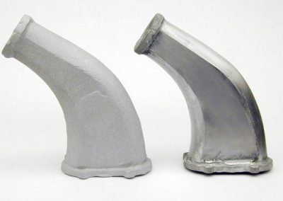 One of the first metal parts to be cast for the engine—an exhaust pipe.