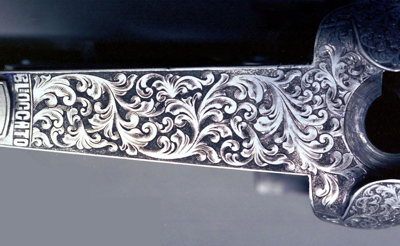 Shotgun Engraving The top tang of a Perazzi over/under shotgun that Roger engraved.