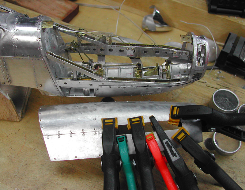 Clamping Parts Parts are clamped while holes are drilled and tapped for countersunk screws.