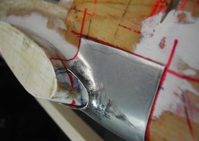 Shaping a panel for the Mustang.