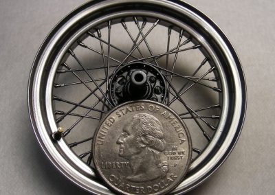 The miniature wheel actually contains a working Schrader valve.