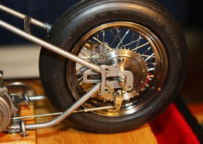 A closer view of the rear brake assembly.