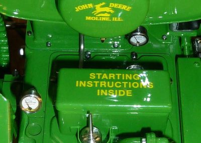 Decals on the John Deere tractor.