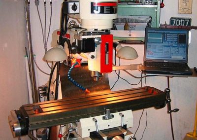 This is the Jet JVM-836 on which Jerry installed ball lead screws, and converted to CNC.