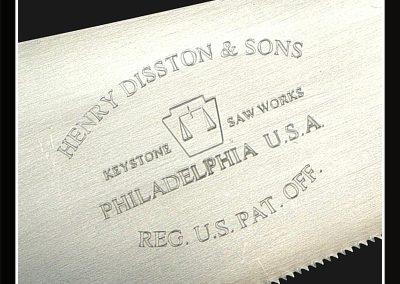 A close-up of the miniature rip saw markings.