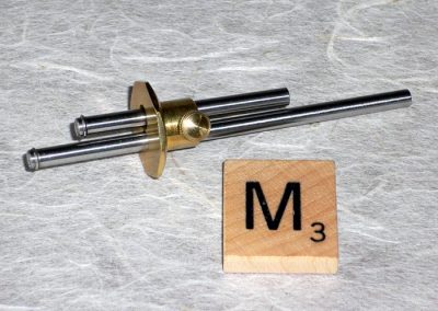 A Scrabble tile puts the gauge’s small size in perspective.