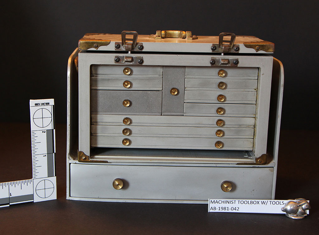 Miniature Machinist’s Toolbox Abraham's machinist's toolbox sits by a ruler for scale reference.