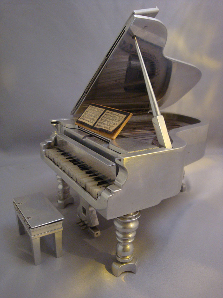 Miniature Grand Piano Another angle of the tiny aluminum grand piano.