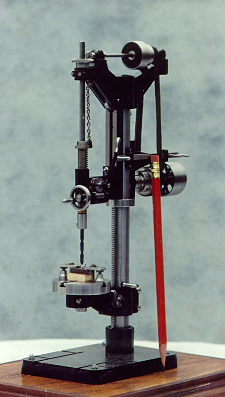 1/6 Scale Drill Press A miniature drill press typical of the era.