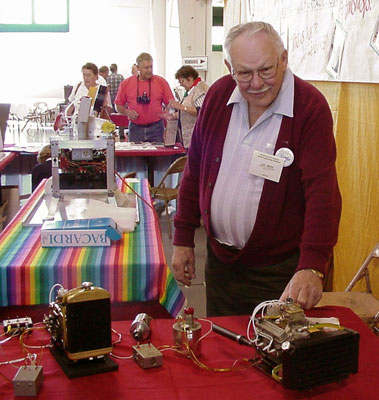 Lee Root Lee Root stands behind his display of engines at the PRIME show in Oregon.