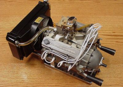 A top view of the V-8 shows the carburetor setup.