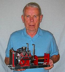 Jerry Howell Jerry Howell holding his prototype V-4 engine.
