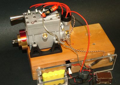 The Seal engine is seen in test mode, with one of the spark plugs grounded to test for spark.