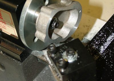 The first cast part for the Seal engine is machined on the lathe.