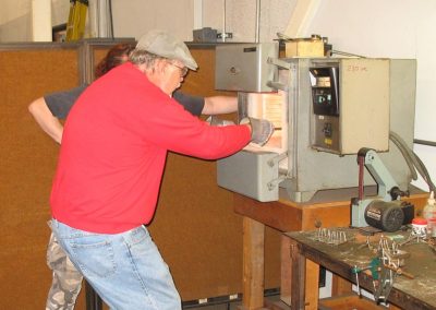 Heat treating the camshaft.