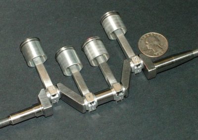 The pistons and rods are assembled to the crankshaft.
