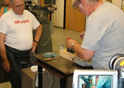 Tom engages the drill motor, and the engine is ready to go.