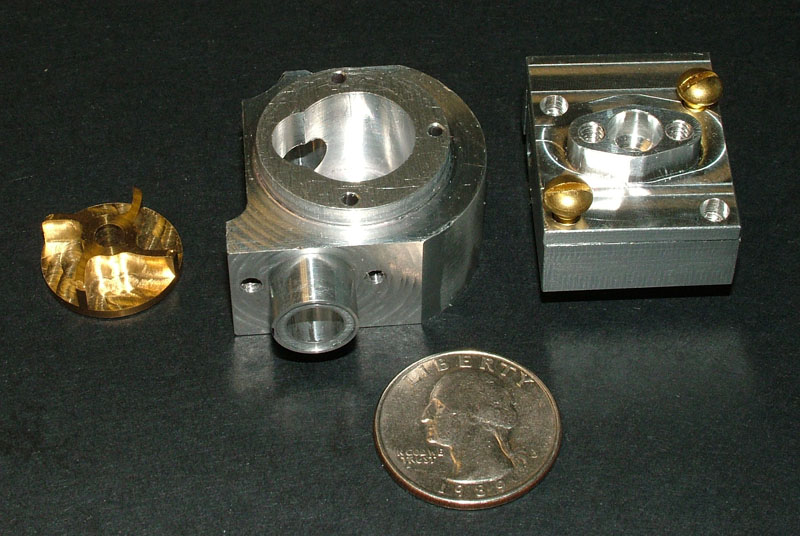 Water Pump Components Robert’s water pump impeller, housing, and pump bracket.