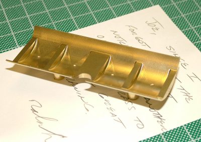 Ralph then made this second pan from brass using EDM.