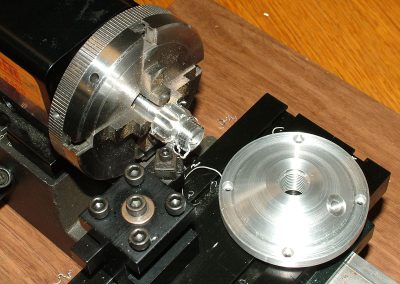 The 1/2-20 thread in the lid of the tank was tapped.