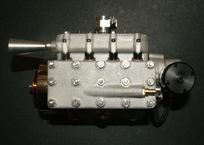 A top view of the engine shows the stinger exhaust pipe.