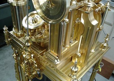 Brass clock components.