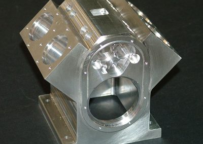 The block was removed from the mill, and the sharp corners were broken slightly with a file.
