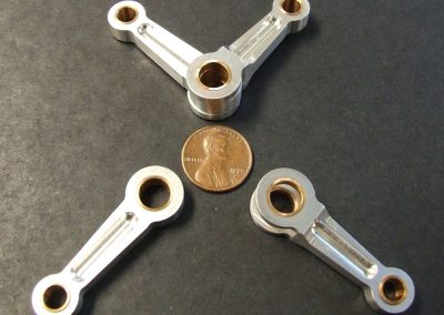 The bronze bushings were turned and pressed into the aluminum connecting rods.