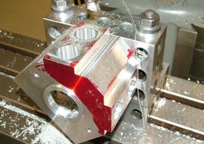 The engine block with all four cylinder holes bored.