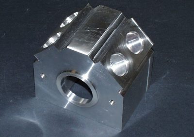 The block was removed from the faceplate after each cylinder hole was counterbored.