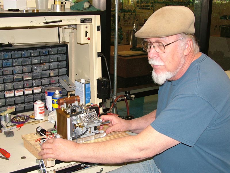 Tom Fine Tuning the Howell V-4 Tom Boyer fine tuning the Howell V-4 engine during its very first run.