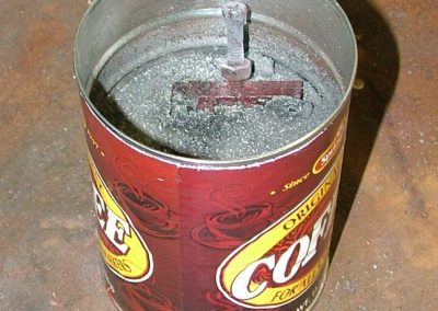 The still glowing fixture soaks in the Kasenit powder.