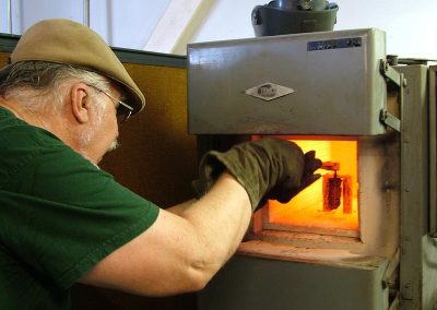 The fixture is returned to the oven.