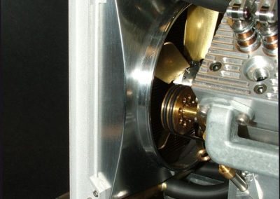 The radiator is installed on the rails in front of the engine.