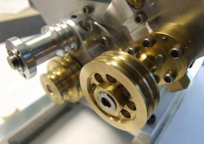 The oil pump components are installed alongside the other pulleys.