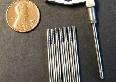 The pushrods have threaded ends to attach to the clevises.