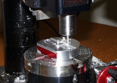 Tom used this fixture in the rotary table to machine the outer shape of the rocker arms.
