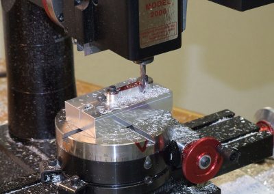 Machining the connecting rods.