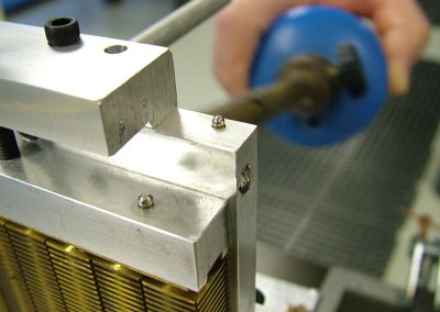 A close-up of the soldering process.