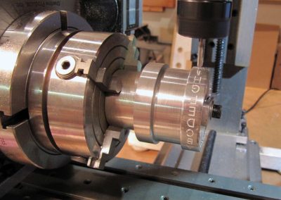 Engraving the lettering on the outer rings.