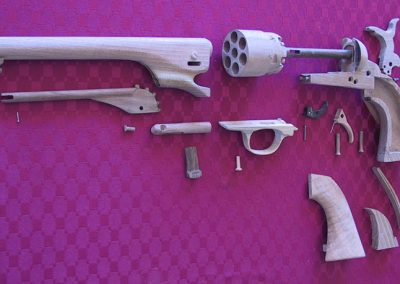 Robert’s Colt Army revolver is disassembled to its component parts.