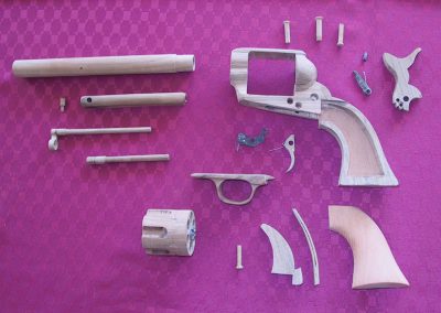 This model uses a metal coil spring in the ejector.