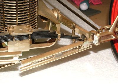 The scale Midget car was shipped to the Craftsmanship Museum for display, but damage in shipping caused the cast front axle to be broken.