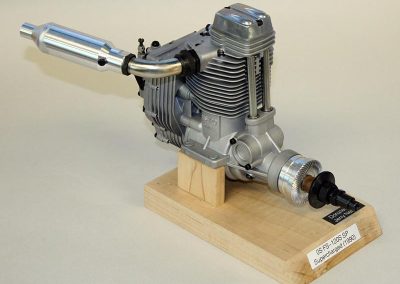 This is an O.S. FS-120S-SP supercharged single-cylinder engine.