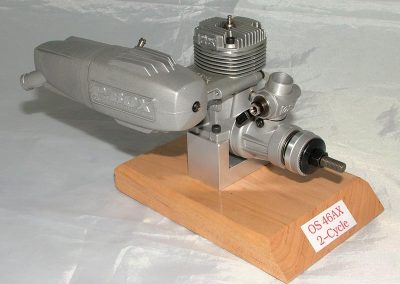 The O.S. MAX-46AX 2-cycle engine.