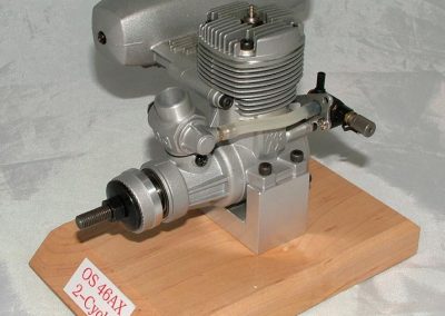 The O.S. MAX-46AX 2-cycle engine.
