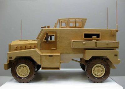 A model MRAP Cougar made of European Beech, maple, and black walnut.