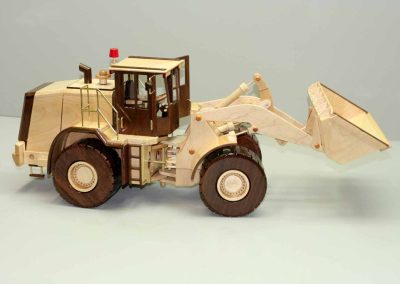 Sunia’s Caterpillar loader is made of maple and black walnut.