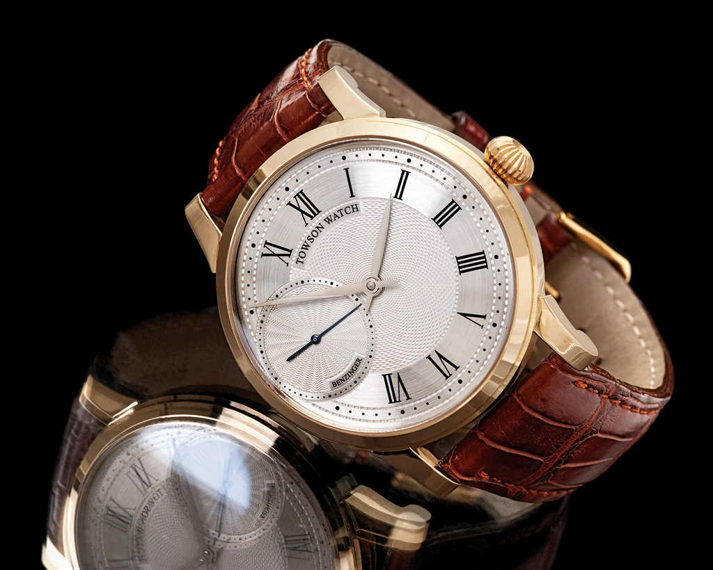 Gold Engraved Watch A gold engraved watch by George's Towson Watch Company.